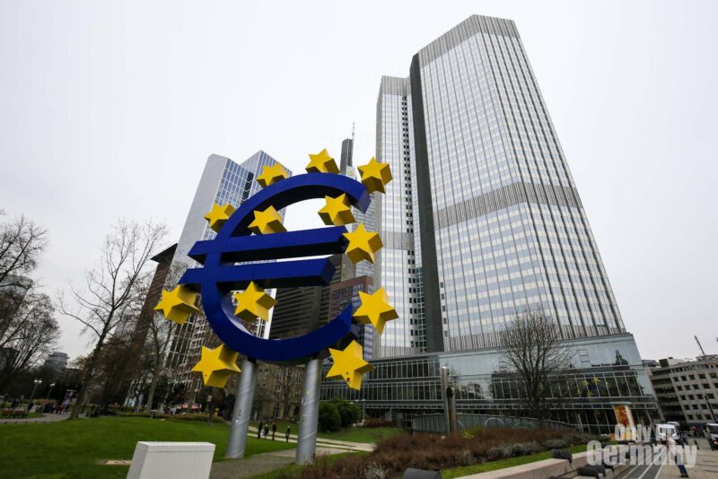 European Central Bank in Frankfurt Germany with a big sign of the Eruo in front of the building.