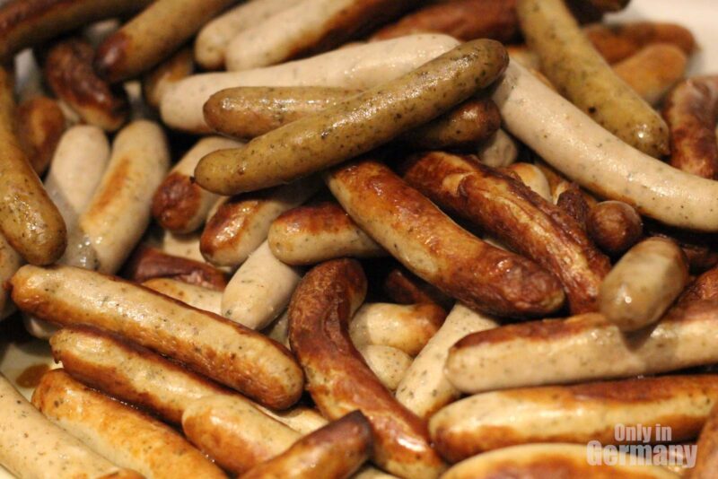Close up to a lot of Frankfurter wursts, ready to be served.