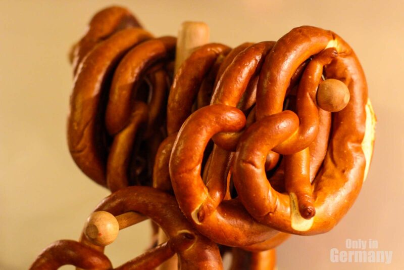 German Pretzels on a wooden stand in a German bakery in Germany.